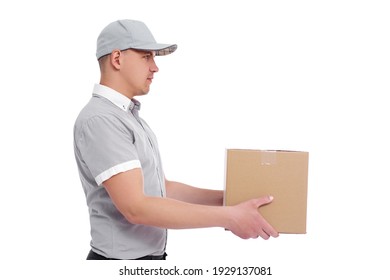 side view of postman or deliveryman giving a box isolated on white background