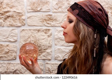 Side View Of A Pretty Female Fortune Teller