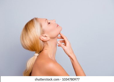 Side View, Profile, Half Face Portrait Of Pretty, Charming, Attractive Woman Enjoying, Touching Her Perfect Neck With Fingers, Having Head Back With Closed Eyes, Moisturizing, Hydration Concept