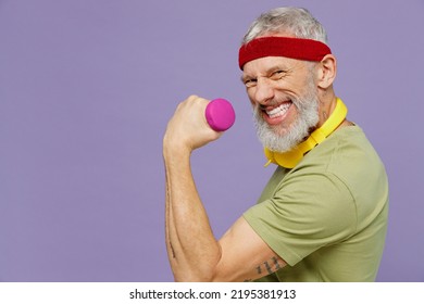 Side view profile strained serious elderly gray-haired bearded man 40s years old in headband khaki t-shirt exercise train with dumbbell isolated on plain pastel light purple background studio portrait - Powered by Shutterstock