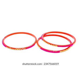 side view of red bangles and red bangles isolated in white background