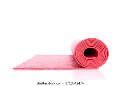 Side view of red open yoga mat for exercise, isolated on white background with copyspace - Powered by Shutterstock