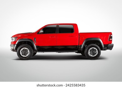 Side view of red powerful pickup truck on white background