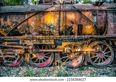 Side view of a rusty train abandoned