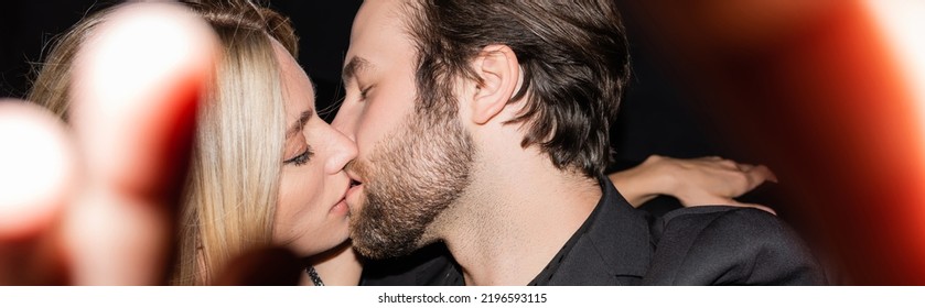 Side View Of Sexy Couple Kissing On Black Background, Banner