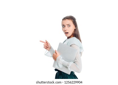 Side View Of Shocked Woman With Laptop Pointing Away Isolated On White