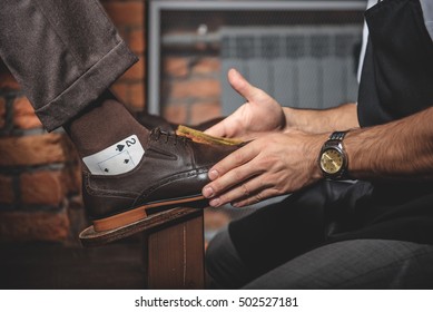 Side View Of Shoe Shine Process