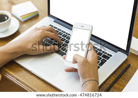 Side view shot of a man's hands using smart phone in interior, rear view of business man hands busy using cell phone at office desk, youngmen student typing on phone sitting at wooden table