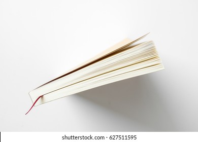 Side View Single Book Open On White Background