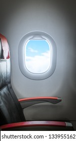 Side View Of Single Empty Seat In Passenger Airplane. Comfortable Leather Black Seat With Red Armrests. Window With Sunlight Aside. Interior Of Plane. Travelling With Comfort By Air. Economy Class.