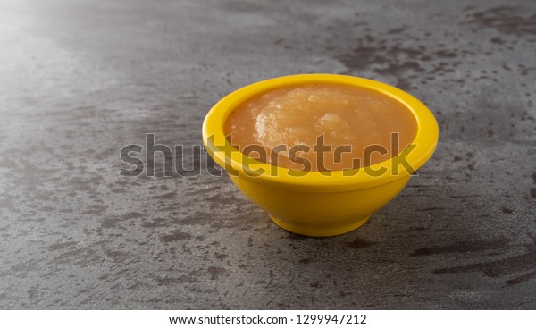 Download Side View Small Yellow Bowl Filled Food And Drink Stock Image 1299947212 PSD Mockup Templates