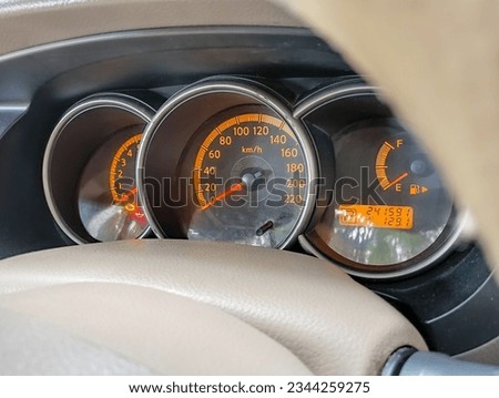 side view of Speedometer on a modern car.