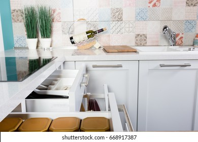 Side View Of A Spices And Groceries Organized In A Modern Kitchen Drawer. Kitchen Design Inspiration. 