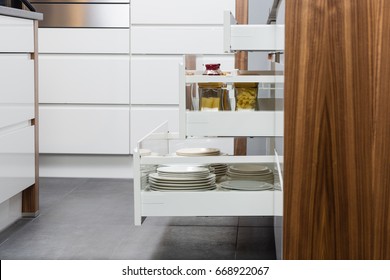 Side View Of A Spices And Groceries Organized In A Modern Kitchen Drawer. Kitchen Design Inspiration. 