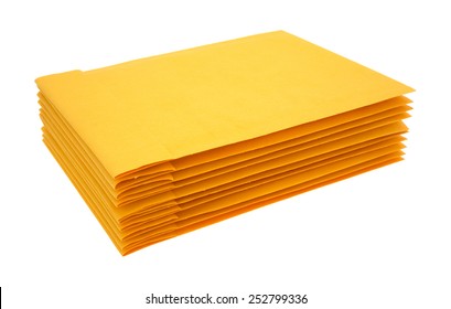 Side view of a stack of blank padded manila envelopes on a white background.