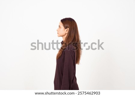 Side view standing with serious face Of Beautiful Asian Woman Isolated On White Background