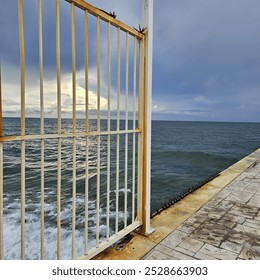 Side view of a storm cloud on a boat dock.
