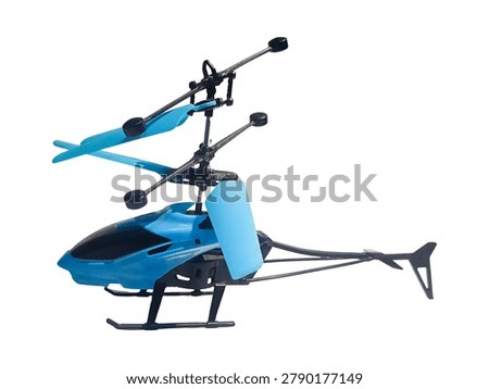 A side view studio shot of a small, modern blue plastic RC (remote control) helicopter toy featuring double rotor blades, isolated on a clean white background. Perfect for themes of children's toys, flying gadgets, electronic games, childhood, and modern hobbies