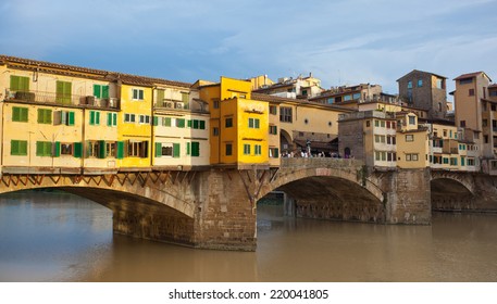 Side view at sunset of Ponte Vecchio in Florence, Italy.