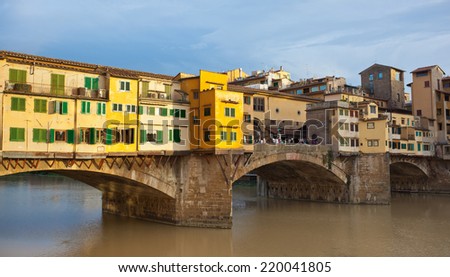 Side view at sunset of Ponte Vecchio in Florence, Italy.