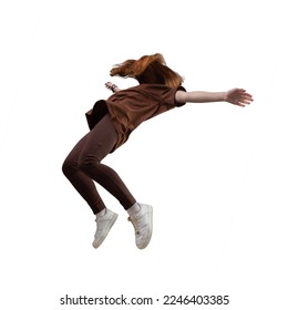 Side view of teen age girl in zero gravity or a fall. Ggirl is flying, Falling or floating in the air. Girl weared in brown trousers and t-shirt. Isolated over white background.
