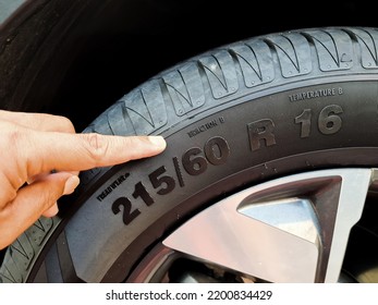 Side view of the tire with the indication of the width of the tire, the height and diameter of the wheel. tire code that includes the temperature code, speed limit and expiration date of the tire and