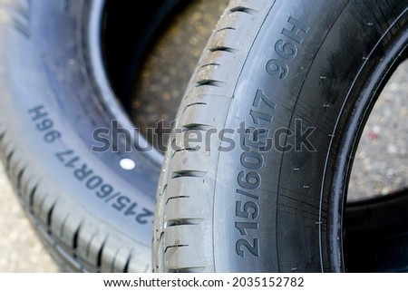 Side view of tire with tire width, height and wheel diameter designation