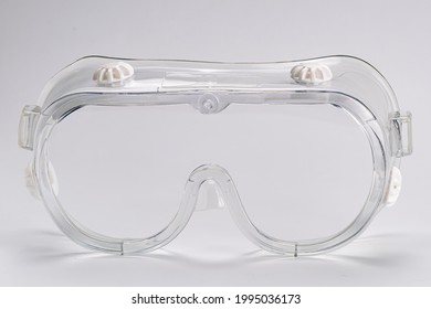 Side View Of Transparent Safety Protective Goggles Isolated On White Background With Clipping Path.