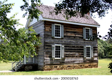 Side View Of A Two Storey Timber House At New Echota Cherokee Capital, Calhoun, Georgia, USA, 26.05.2016 