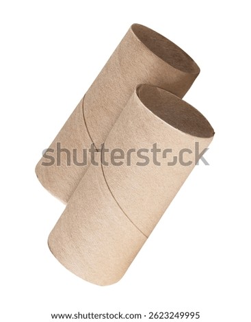 Side view of two tissue paper cores or toilet paper tubes after tissue paper used out in stack is isolated on white background with clipping path.