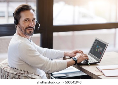 Side view of an using laptop