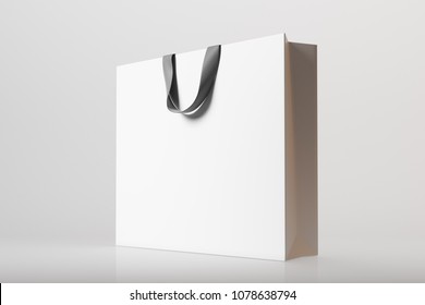 Side View Of A White Shopping Bag On A Gray Background. 3d Rendering Mock Up