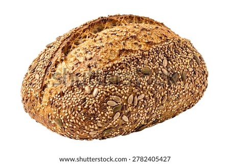 Side view of whole grain bread loaf with mixed seeds and nuts isolated on white background.