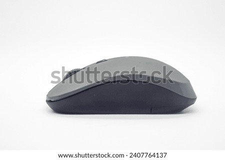 side view of a wireless mouse isolated on a white background