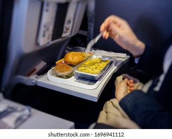 755 Woman Eating On A Plane Images, Stock Photos & Vectors | Shutterstock