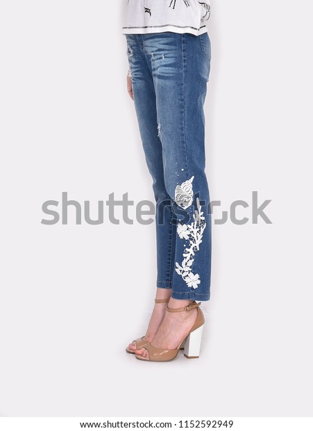 jeans with flowers on the side
