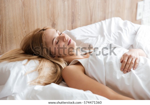 Side View Woman Sleeping On Bed Stock Photo (Edit Now) 574471360