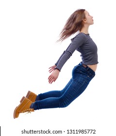 Side view of woman in zero gravity or a fall. girl is flying, falling or floating in the air.  side view of person. Isolated over white background. Young girl with fluttering hair flies up.