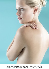 Side View Of A Woman's Bare Back And Shoulder.