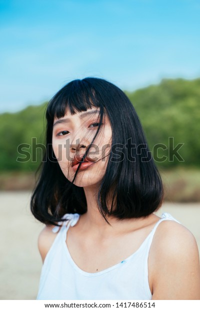Side View Young Asain Woman Tousled Stock Photo Edit Now 1417486514