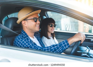 Side view young asian couple happiness sitting in car. Travel concept, Safety first insurance concept - Shutterstock ID 1249494550