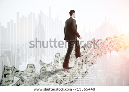 Side view of young businessman walking on abstract dollar banknote ladder on bright New York city background with copy space. Money concept. Double exposure 