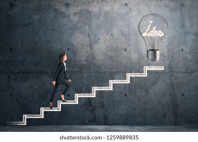 Side view young businesswoman climbing abstract drawn stairs and idea lamp concrete background  Solution   growth concept 