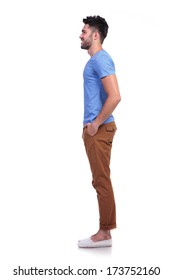 Side View Of A Young Casual Man Standing In Line On White Background