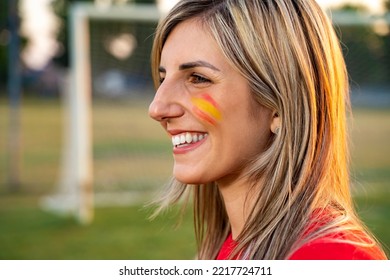 Side View Young Girl Spain National Team Fan, Face Painted Spanish Flag 