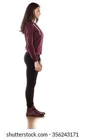 Side View Of A Young Woman In A Track Suit And Pants