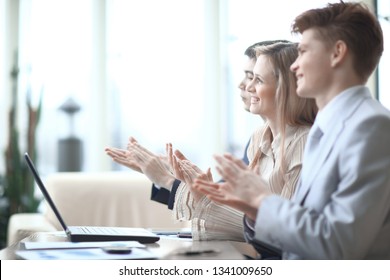 Side View.business Team Applauds The Speaker.photo With Copy Space