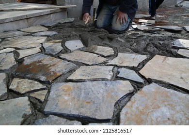 Side Walk Under Construction By Worker 