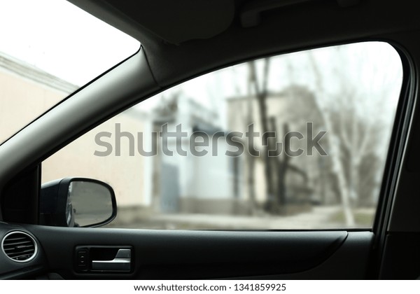 Side window of\
modern car, view from\
inside