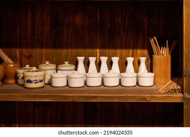 Sideboard And Utensils In Traditional Chinese Restaurant